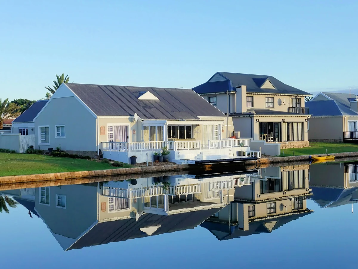 Row of white houses with fresh exterior painting in Winchester