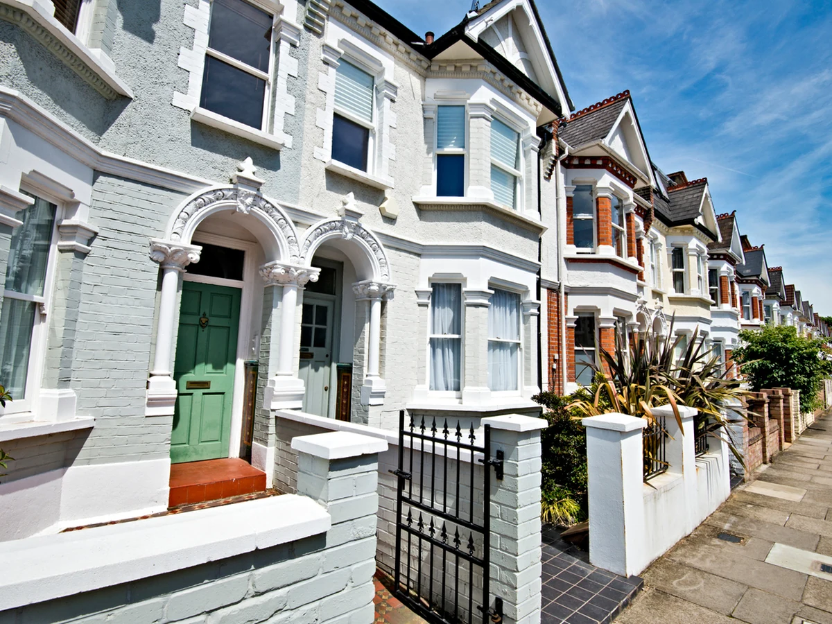 Row of freshly rendered white houses painted in Winchester, Hampshire