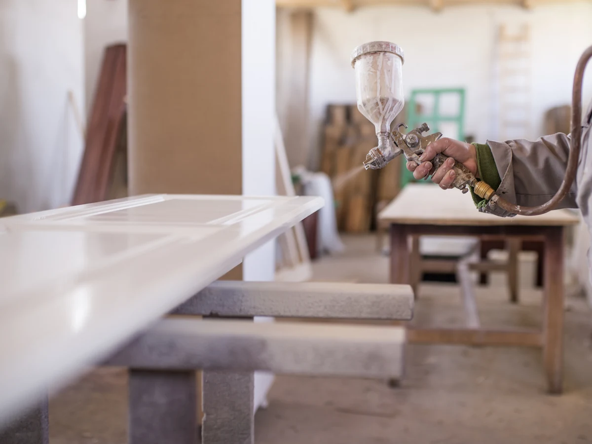 Painting Decorating Person Spray White by Winchester Decorators in Winchester